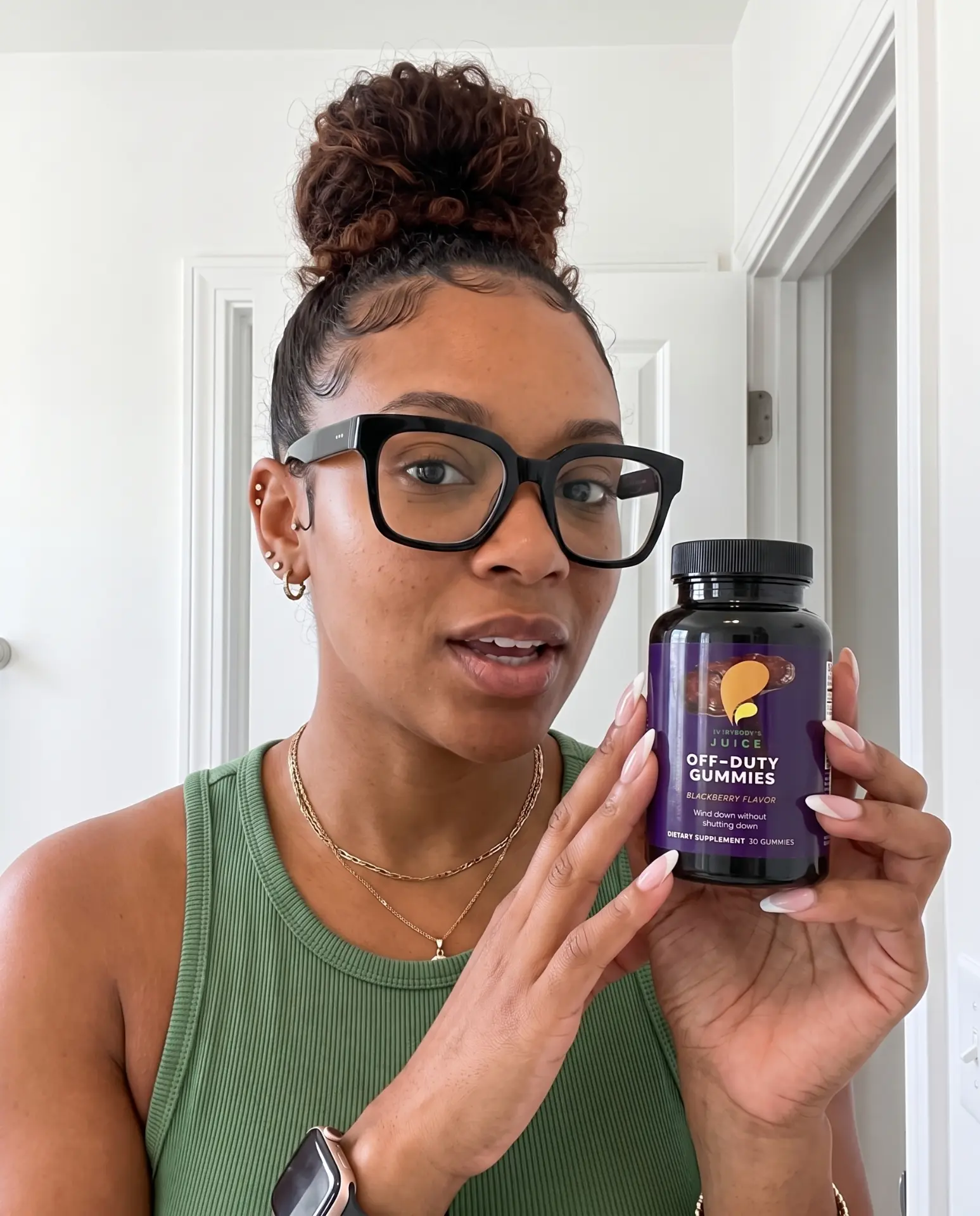 Lorraine M. holding Off-Duty gummies
